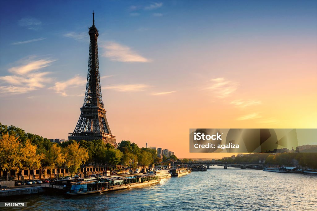 the eiffel tower in paris france, at sunset