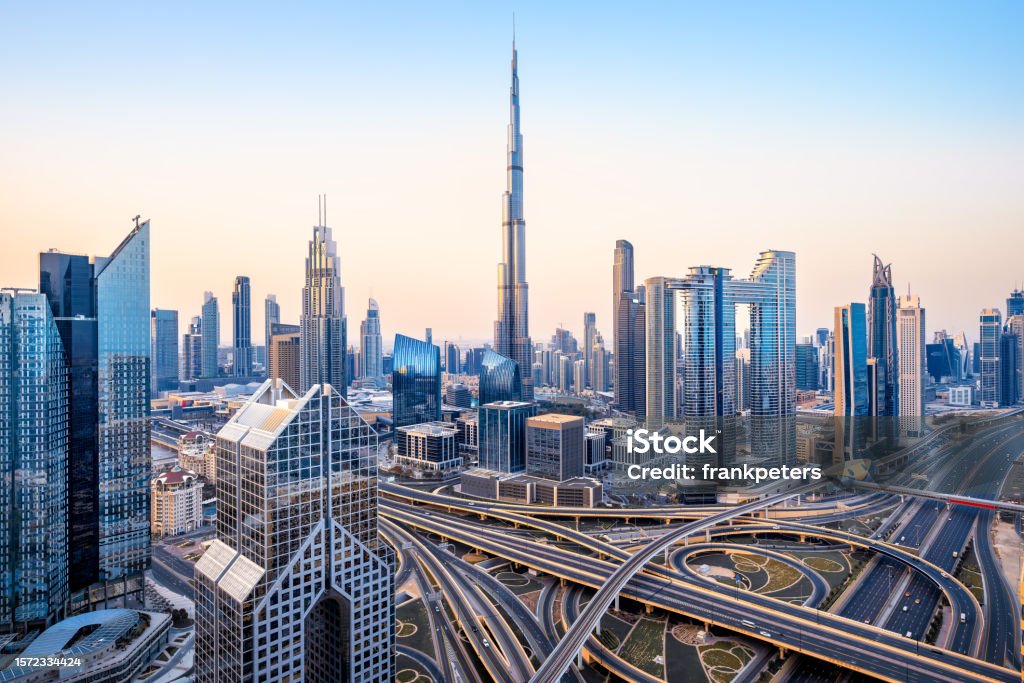 the skyline of dubai during sunrise